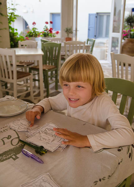 Pre-dinner colouring  - Rykersaurus at Palatia Cafe near Agia Anna, Naxos